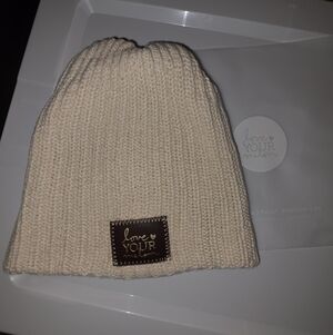 Love Your Melon Cream Knit Beanie with Brown Leather Patch